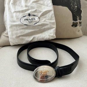Prada belt Black patented leather with Silver and Gold Prada buckle. 34/85